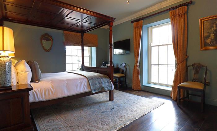 Our Deluxe rooms feature enhanced decor in the Georgian style. Some have four-poster beds or attractive views to the front of the property overlooking